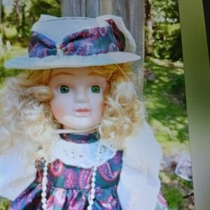 Blonde Porcelain Doll with Green Eyes